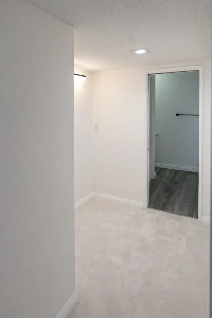 Small, empty room with open doorway.